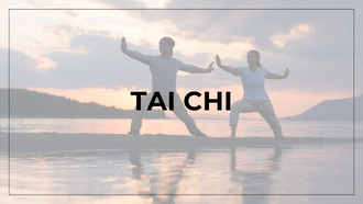 Two individuals practicing Tai Chi at sunset 
